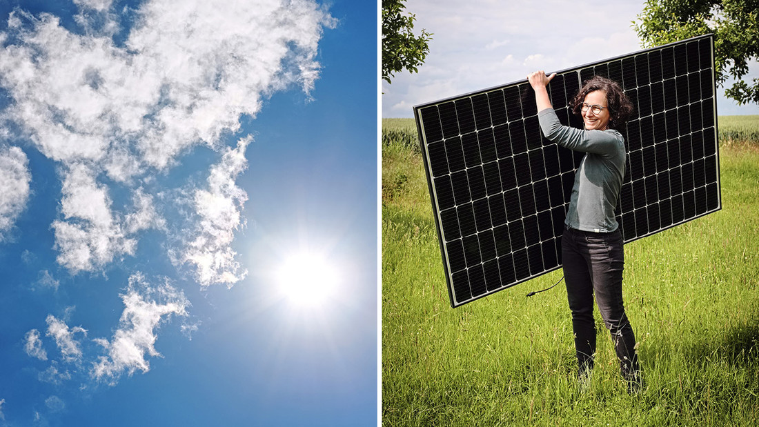 Kristina Wittig steht auf eine Wiese und hält ein Solarpanel in den Händen 