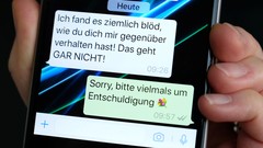 Handy mit WhatsApp-Nachrichten