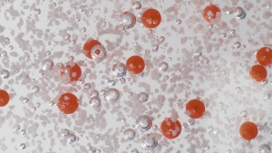 Microbeads, Kunststoffpartikel in einer Peeling-Lotion