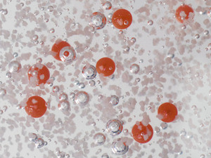 Microbeads, Kunststoffpartikel in einer Peeling-Lotion