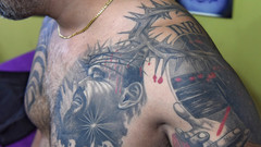 Jesus Tattoo auf Brust