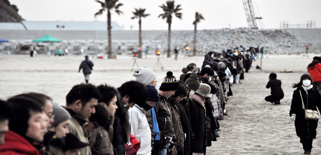 People Pray For Victims And Reconstruction At Beach In Iwaki 