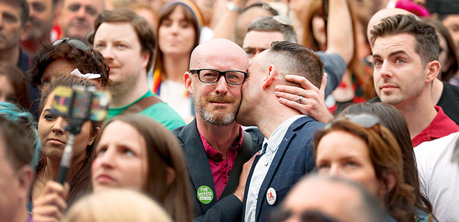 People react as Ireland voted in favour of allowing same-sex marriage in a historic referendum, in Dublin May 23, 2015. Ireland became the first country in the world to adopt same-sex marriage by popular vote as 62 percent of the electorate backed a refere